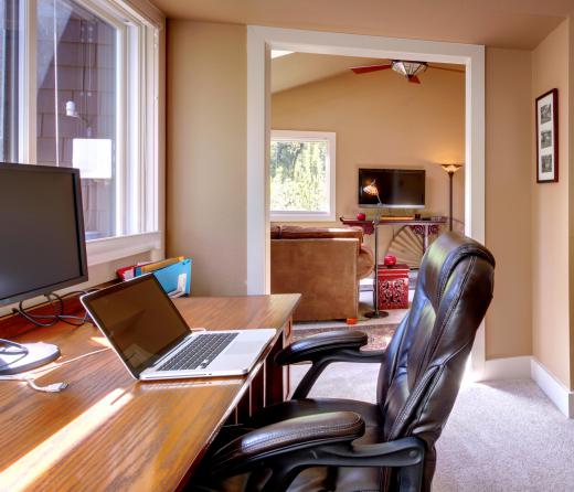 A desk and a computer are essential requirements for a home office.