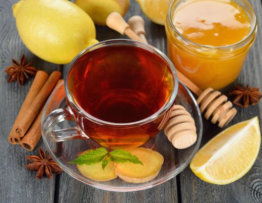 Hot tea with honey can help soothe a sore throat.