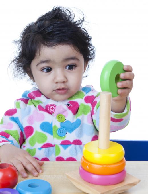 Toys of different colors and shapes can help a child's understanding of building and improve motor coordination.