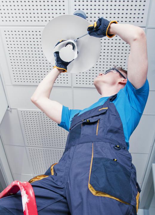 Building maintenance workers are responsible for electrical maintenance of a building.