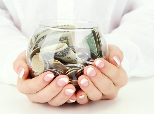 People usually collect change in a coin counting jar to deposit in a bank account later.