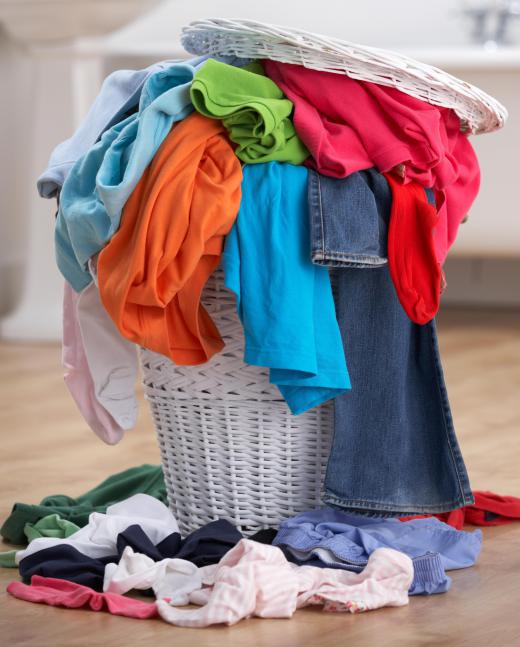 Wicker hampers may be used to organize dirty laundry.