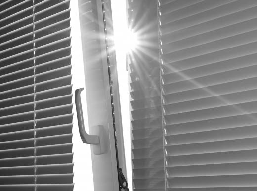 Some vinyl blinds come in a black out variety that blocks out almost all light.