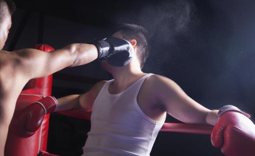 Getting punched in a boxing match is a common way for a person to dislocate their jaw.