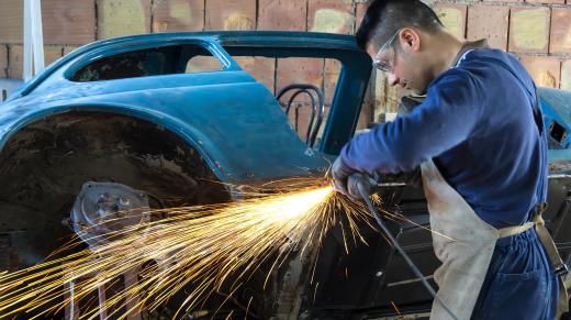 Training to become an automotive machinist could include lessons with welding equipment.