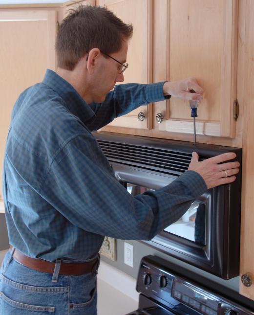 A microwave oven may be installed on top of a stove to help save counter space.