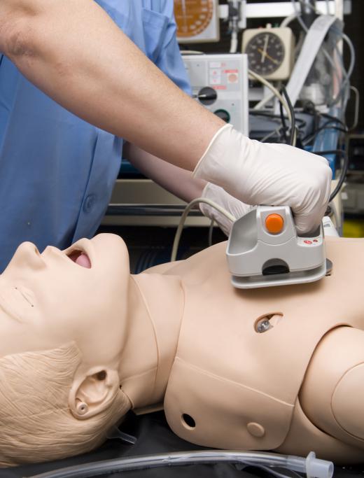 AED trainers talk people through how to use automatic defibrillators.