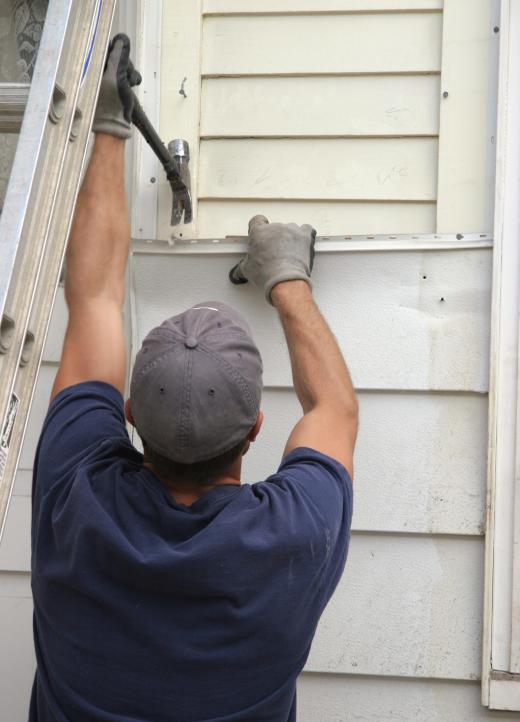 Someone who is replacing the siding on a house may have a contract with the homeowner to complete the work.