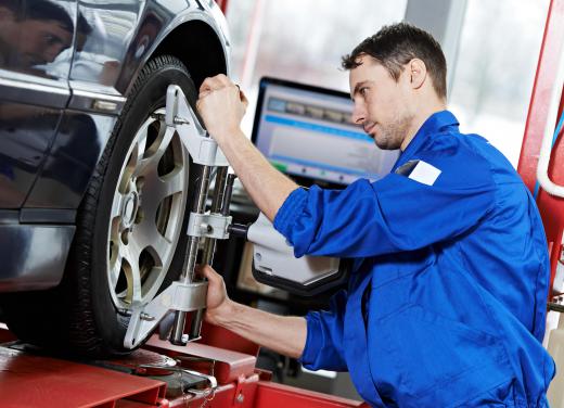 Factors that determine an auto mechanic's salary include years on the job, certifications and the kind of shop at which the mechanic works.