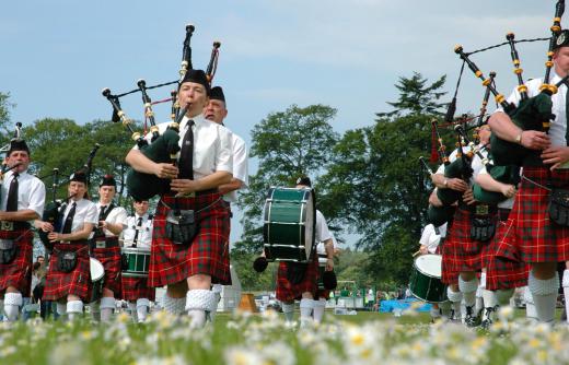 Pipe bands feature bagpipe players and drummers.