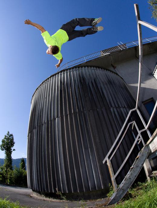 Urban areas often play host to free runners who attempt to move over, through, around, or under man-made and natural objects within a cityscape.