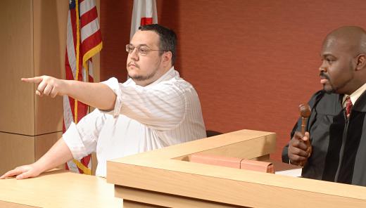 A panel of individuals determines the outcome of a case based on witness testimony and evidence presented by opposing sides in an adversary system.