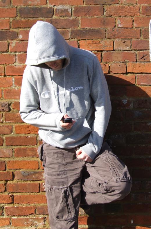 A man wearing a hoodie.