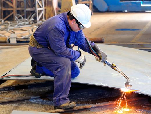 Some boilermaker apprentices learn to fabricate metal parts for manufacturing settings.