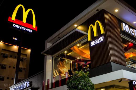 McDonalds is a great example of a sign including a central element that becomes iconic, in the case of the golden arches.