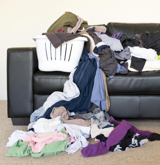 Compromising about which partner does which chore, like the laundry, is one way couple make life smoother.