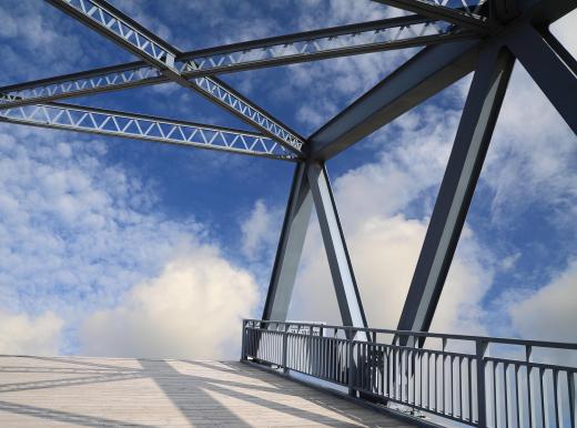 Design engineers may get hired for government-funded projects such as designing bridges.