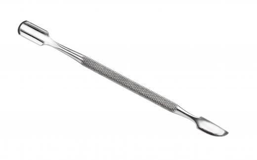 A metal cuticle pusher.