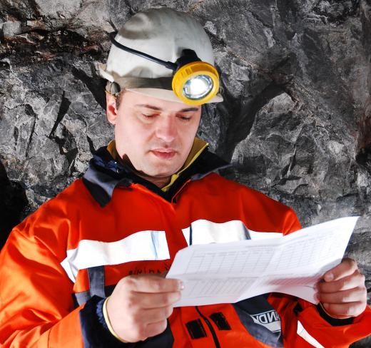 Occupational health professionals may perform safety inspections at mines to ensure safety regulations are being met.