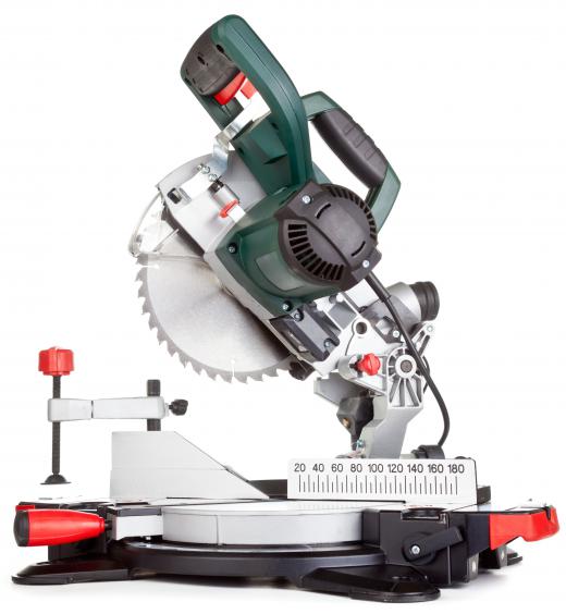 A miter saw is used to cut and install wainscoting.