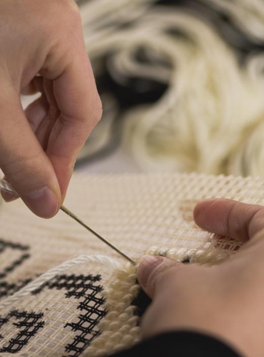 Kids learning needlepoint should first practice threading a needle.