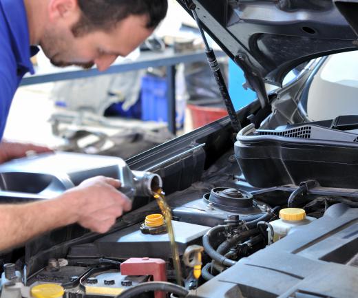 An auto mechanic might improve his skills at a trade school.