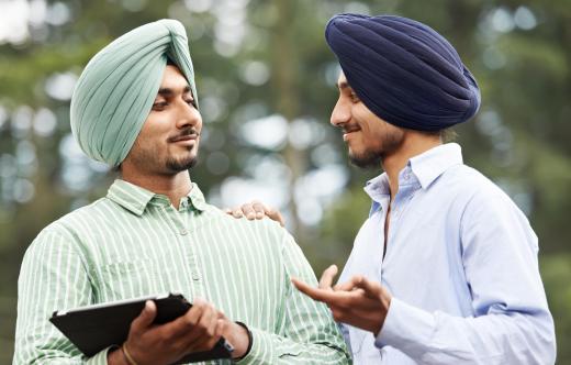 Sikh men refrain from cutting their hair and wear distinctive turbans, in accordance with religious scripture.