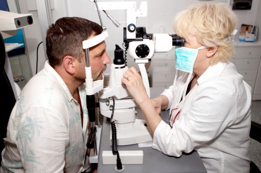 A person having an eye exam to check for retinal diseases.