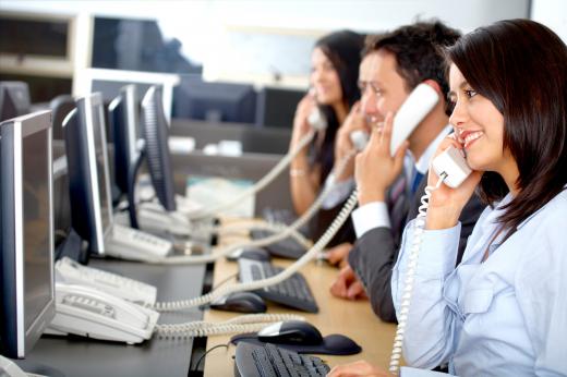 People working a help desk.