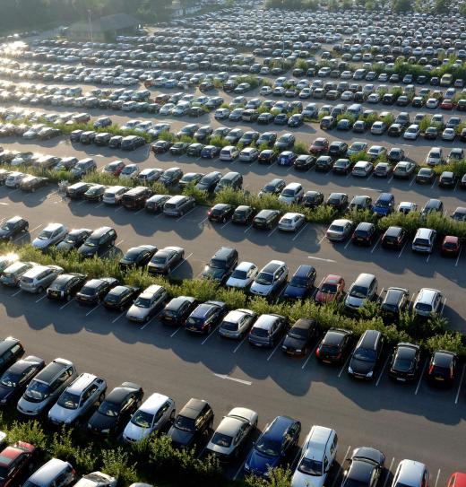 Many parking lots are paved with asphalt.