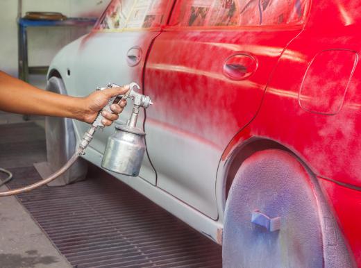 A wet sander may be used to refinish auto paint.