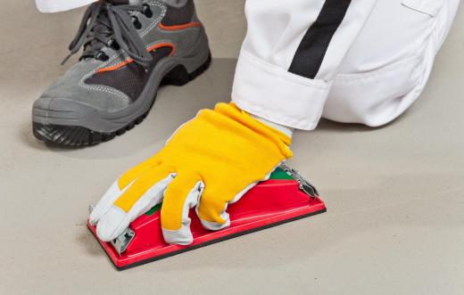 Installing flooring sometimes requires sanding the subfloor.