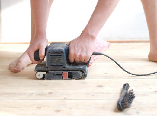 A hardwood floor sander can smooth the floor before painting or refinishing.