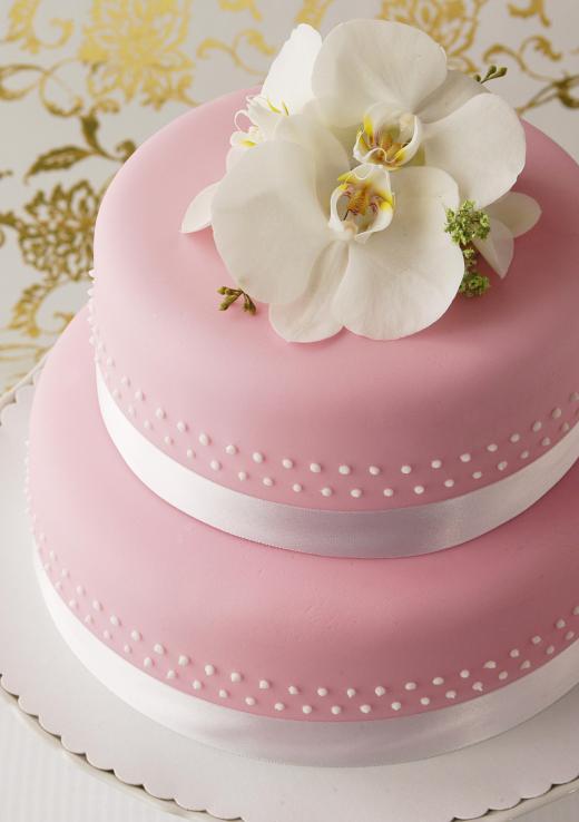 A wedding cake is notoriously difficult dessert to make, which is why it is often decorated in fondant frosting.