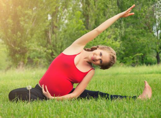 Performing gentle stretching exercises may help alleviate lumbar back pain during pregnancy.