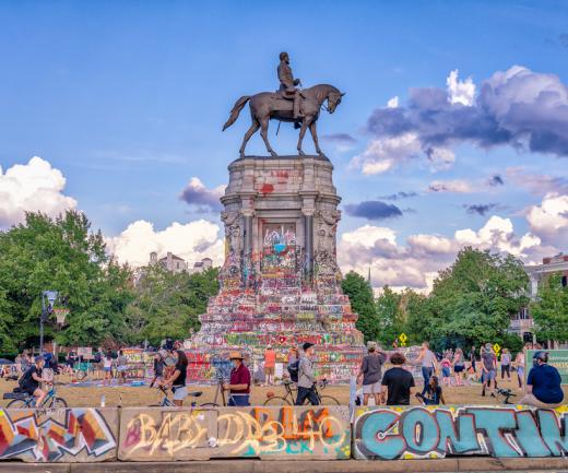 Historians have opened a 134-year-old time capsule buried in the pedestal of Richmond's Robert E. Lee monument, (shown here covered in Black Lives Matter graffiti before its removal).