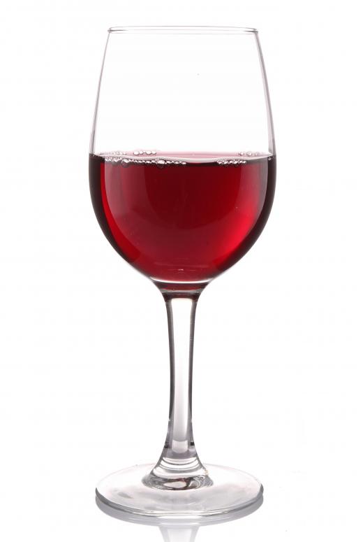 A glass of red Greek wine.