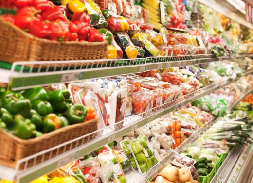 Assistant managers at supermarkets have many responsibilities, including ensuring that food displays are well stocked and neatly arranged.