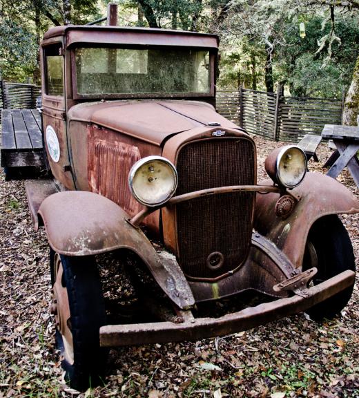 A rusted classic car.