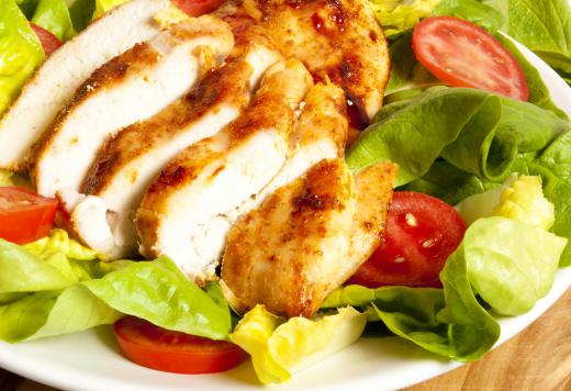 Tangy French dressing can add flavor to a green salad topped with grilled chicken.