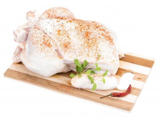 Chicken stuffed with apricots and wild rice, ready for roasting.