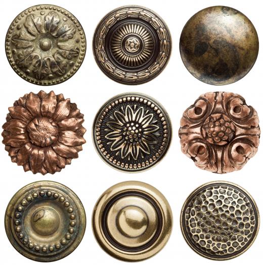 Fire gilding is traditionally used for buttons.