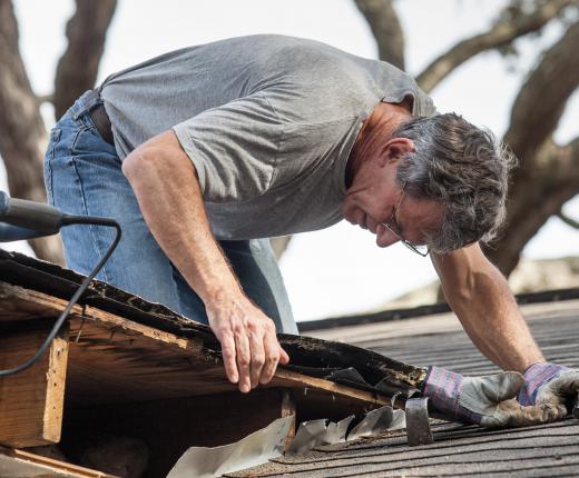 A roof inspector is responsible for examining the roof of a building and completing a report detailing its condition.