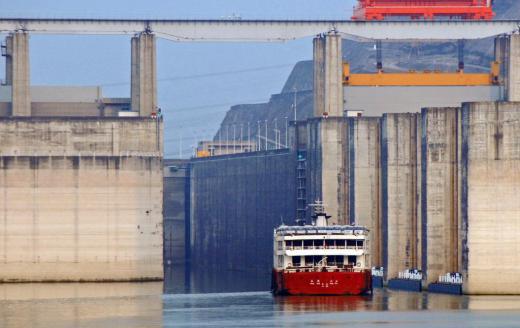 A ship going through a lock at the Three Gorges Dam, the world's largest hydroelectric dam, a source of renewable energy.