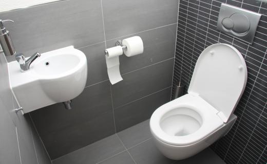 Some commercial washrooms will have a toilet and sink partitioned off together.