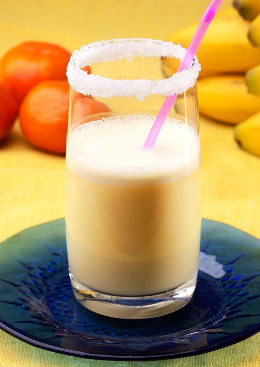 A frozen drink maker can be used to make a tropical fruit smoothie spiked with rum.