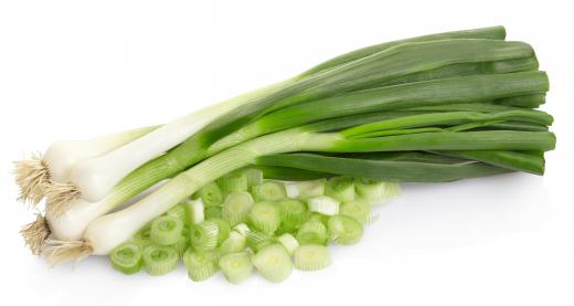 Spring onions are a common topping for hachis parmentier.