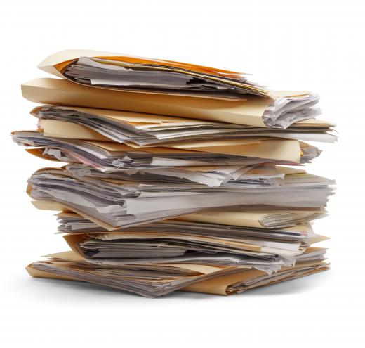 Documents can be organized into folders and then stored in filing cabinets.