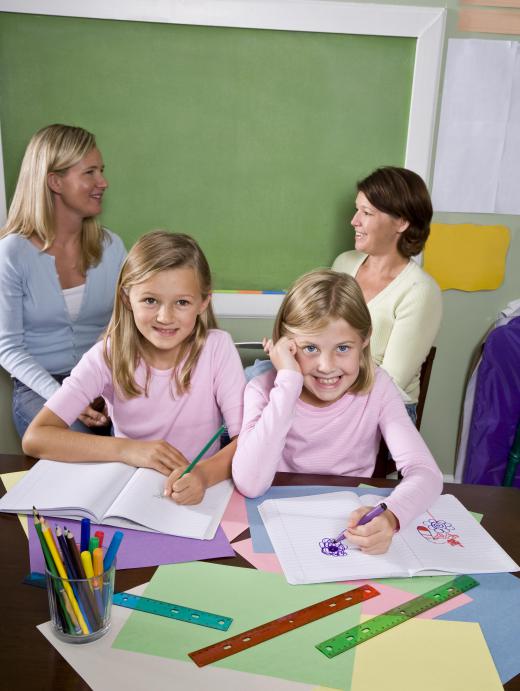 A teaching assistant may help students with academics and behavior.