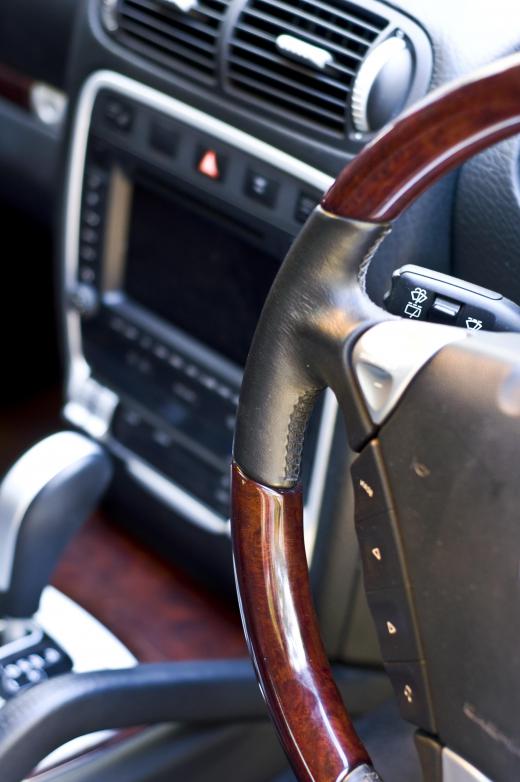 Prospective buyers at an auction will likely inspect a vehicle's interior, among other elements.